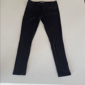 Black tapered dress pants.
